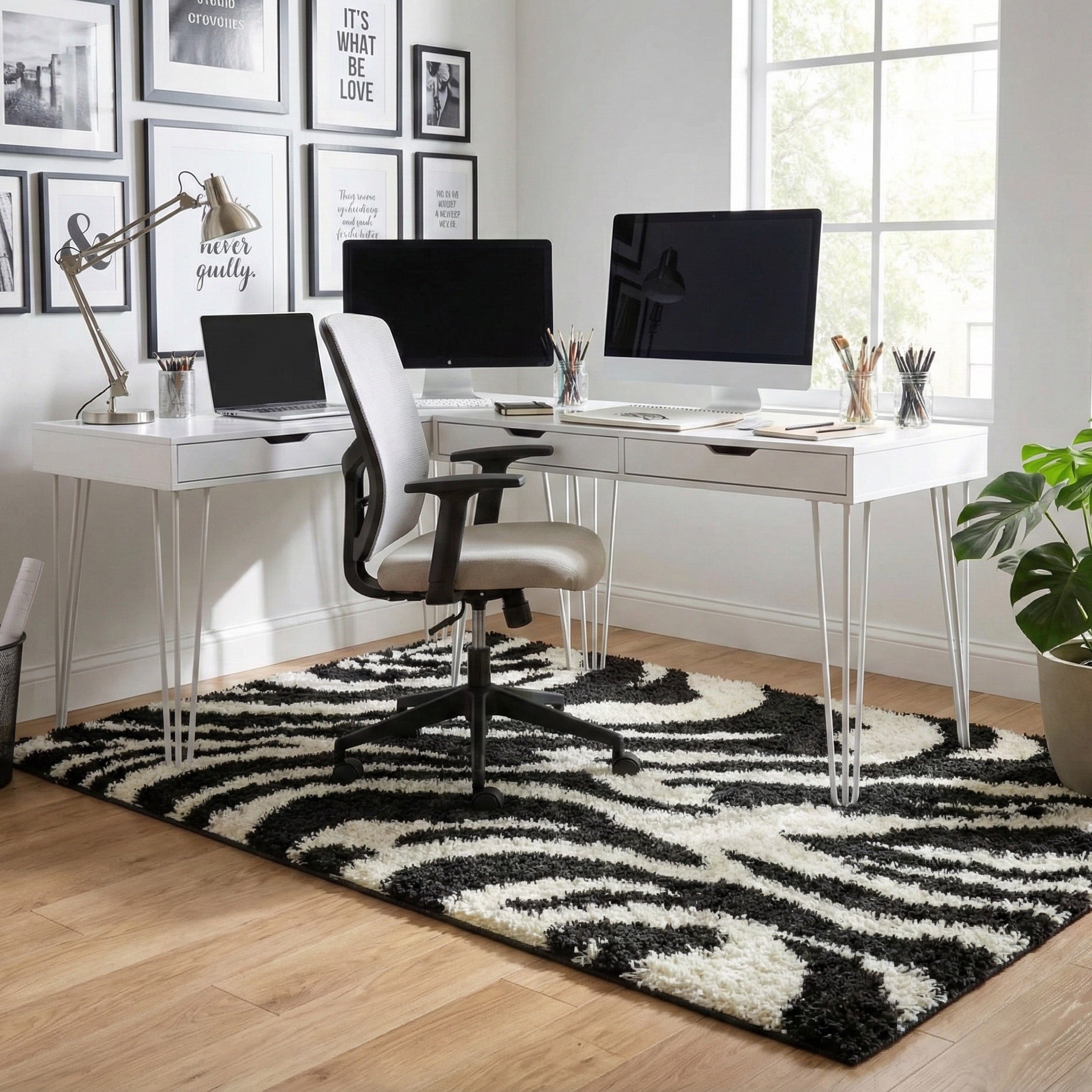 7033 - Modern home office with a white desk, chairs, and computer monitors on a zebra print shag rug.