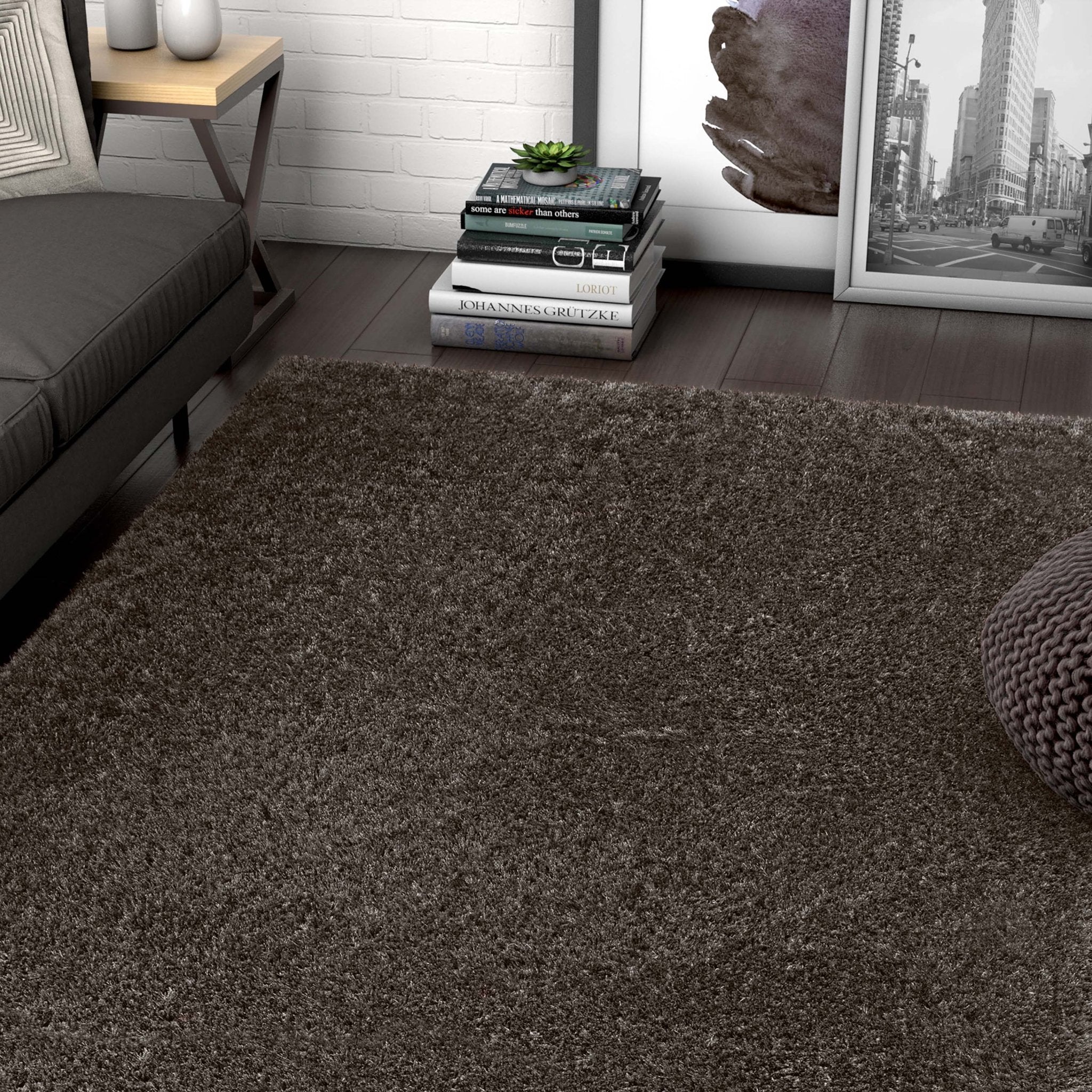 Feather Collection Liza Black Shag Rug – Sparkly, Plush, Minimalist Glam - Well Woven - black shag rug in an urban apartment