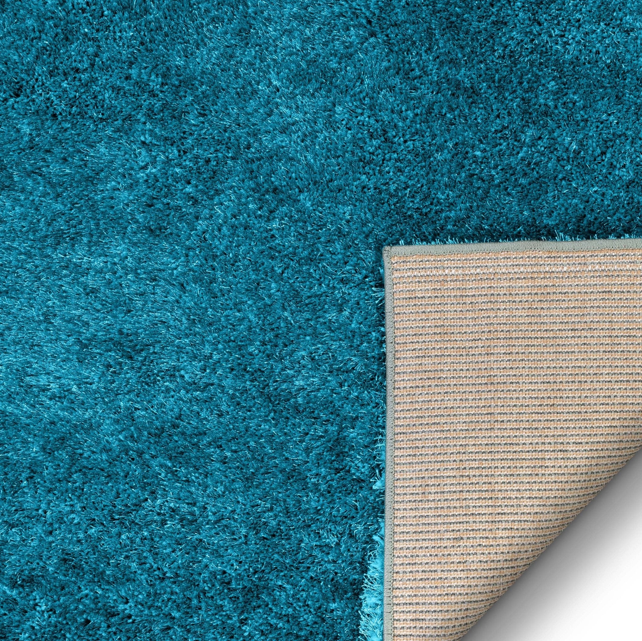 Feather Collection Liza Blue Shag Rug – Sparkly, Plush, Minimalist Glam - Well Woven - Teal rug backing