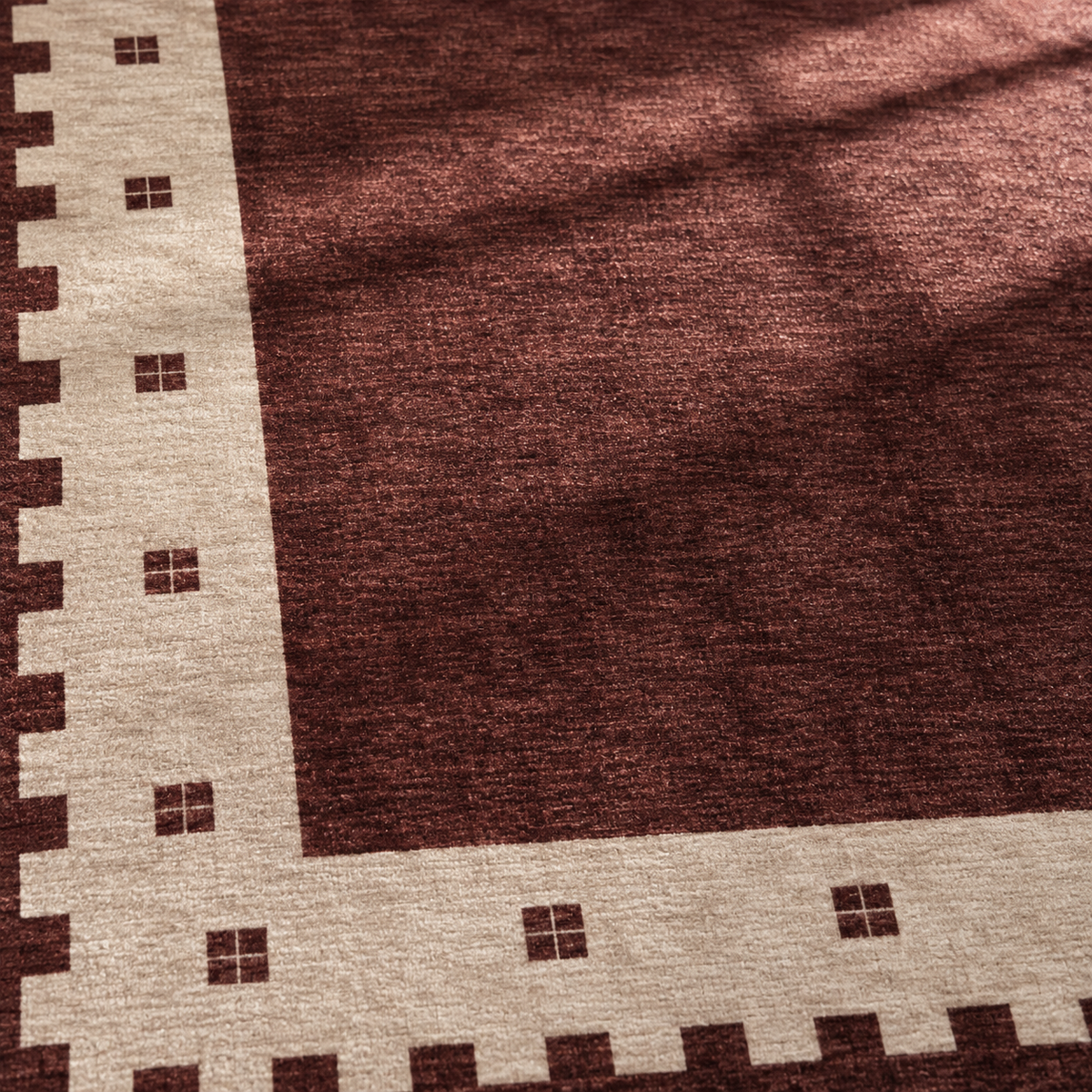Apollo Evening Frame Area Rug — Burgundy / Cream — pattern and surface detail in soft afternoon light. Digital visualization.