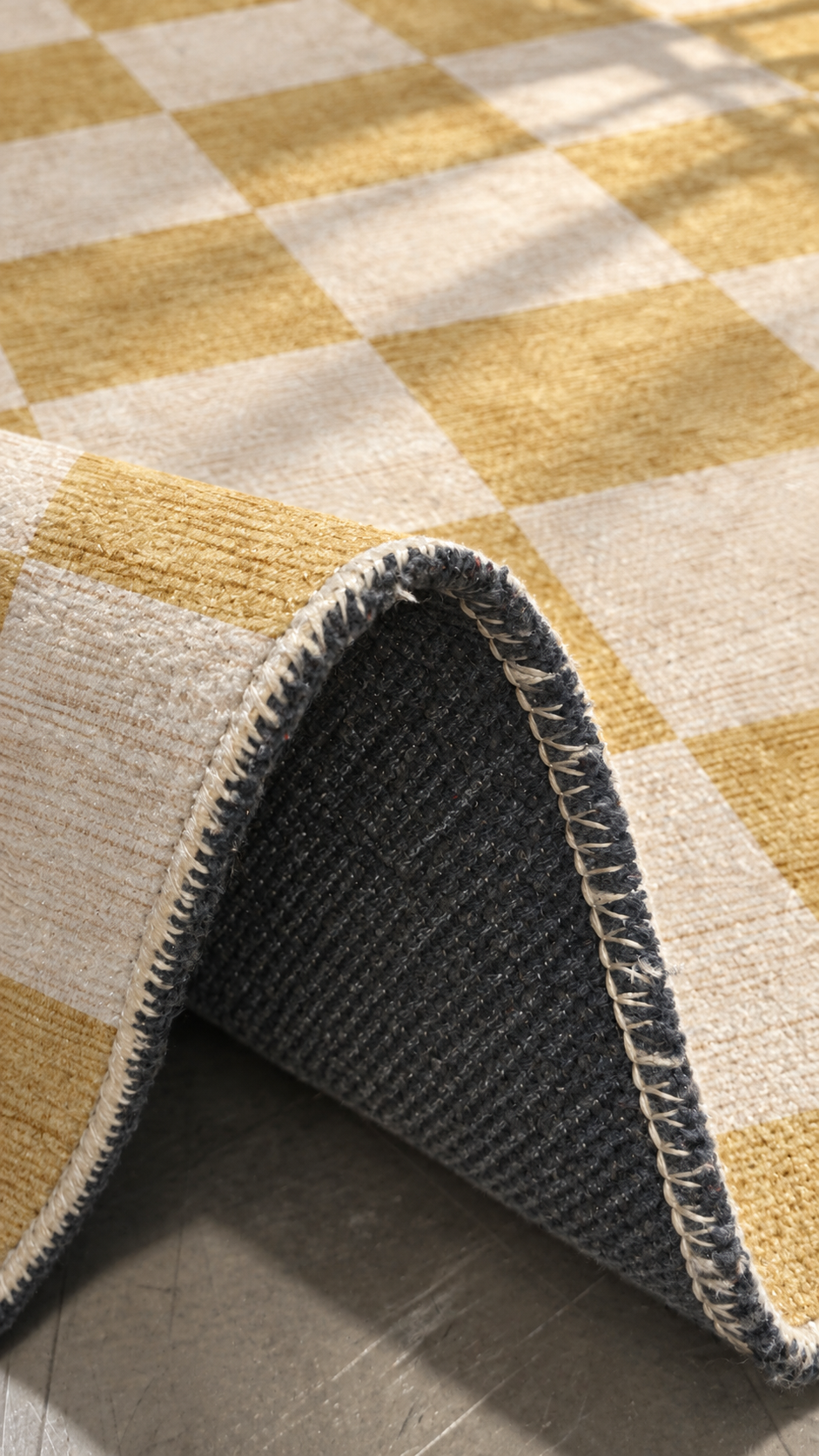 Apollo Sunday Check Area Rug — Mustard / Cream — folded rug detail in soft afternoon light. Digital visualization.
