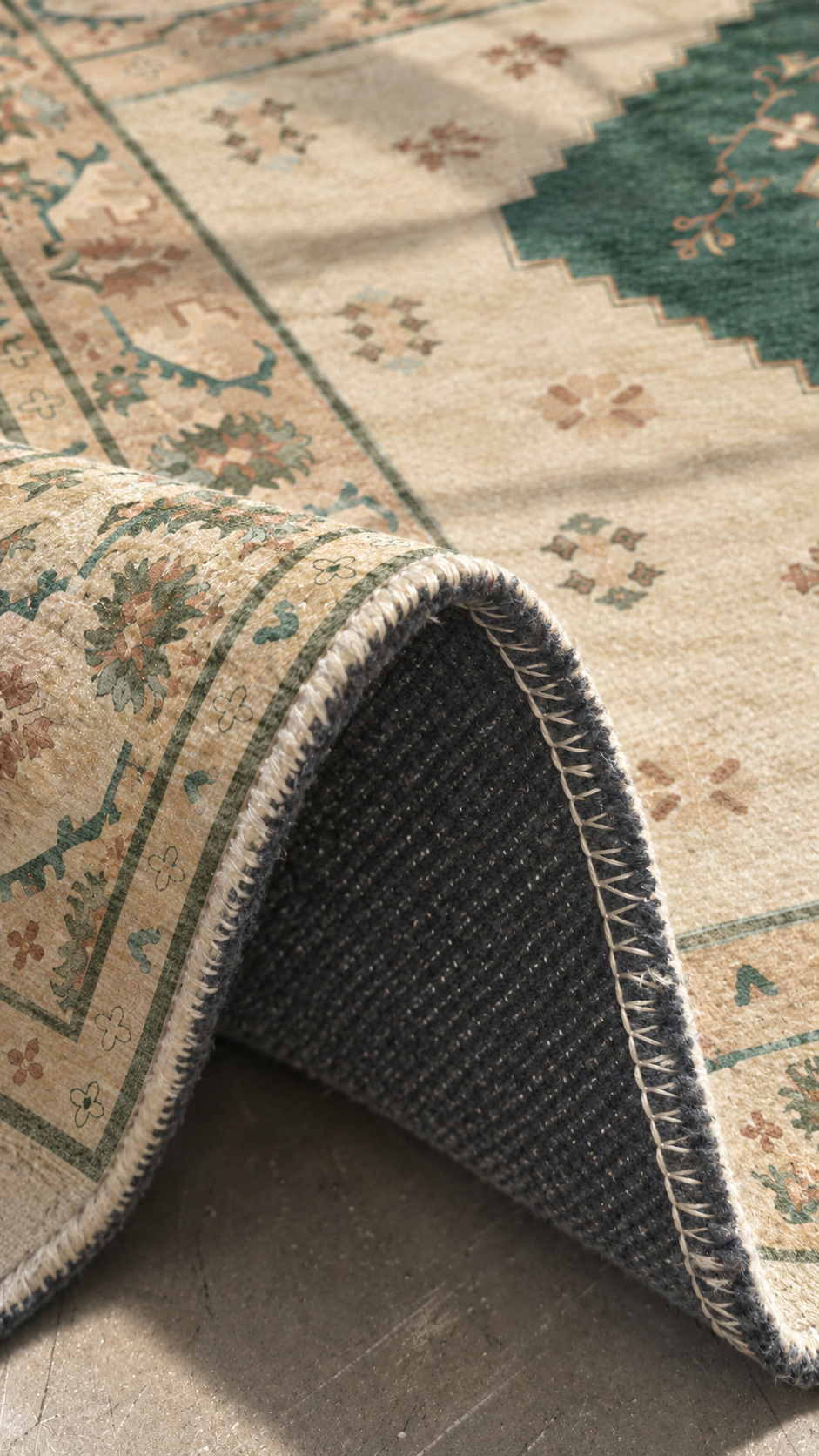 Apollo Orchard Passage Area Rug — Pine Green / Cream — folded rug detail in soft afternoon light. Digital visualization.