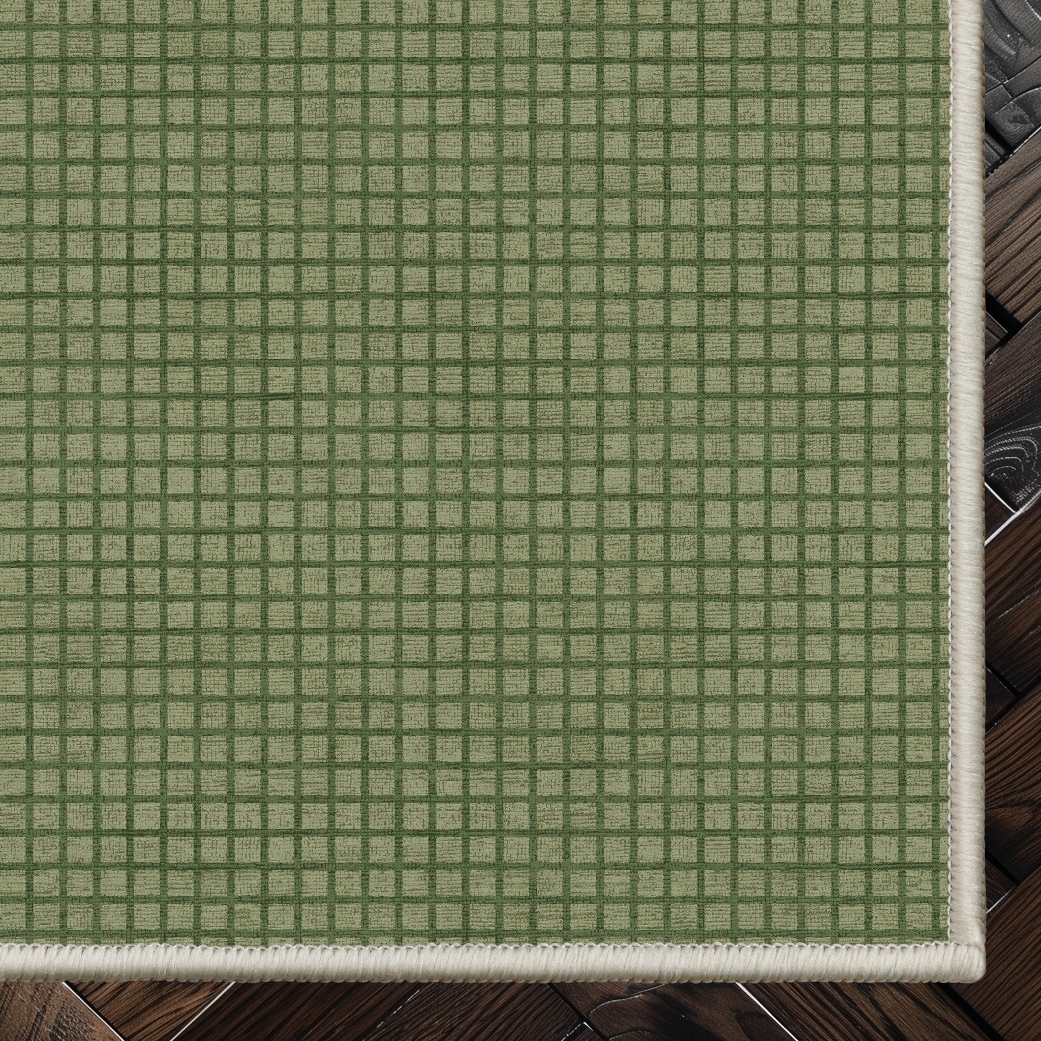 Ulfred Custom Rug - Monochrome Grid , Low Pile, Easy Clean, Personalized Sizes - Well Woven - green rug corner on a dark wood floor