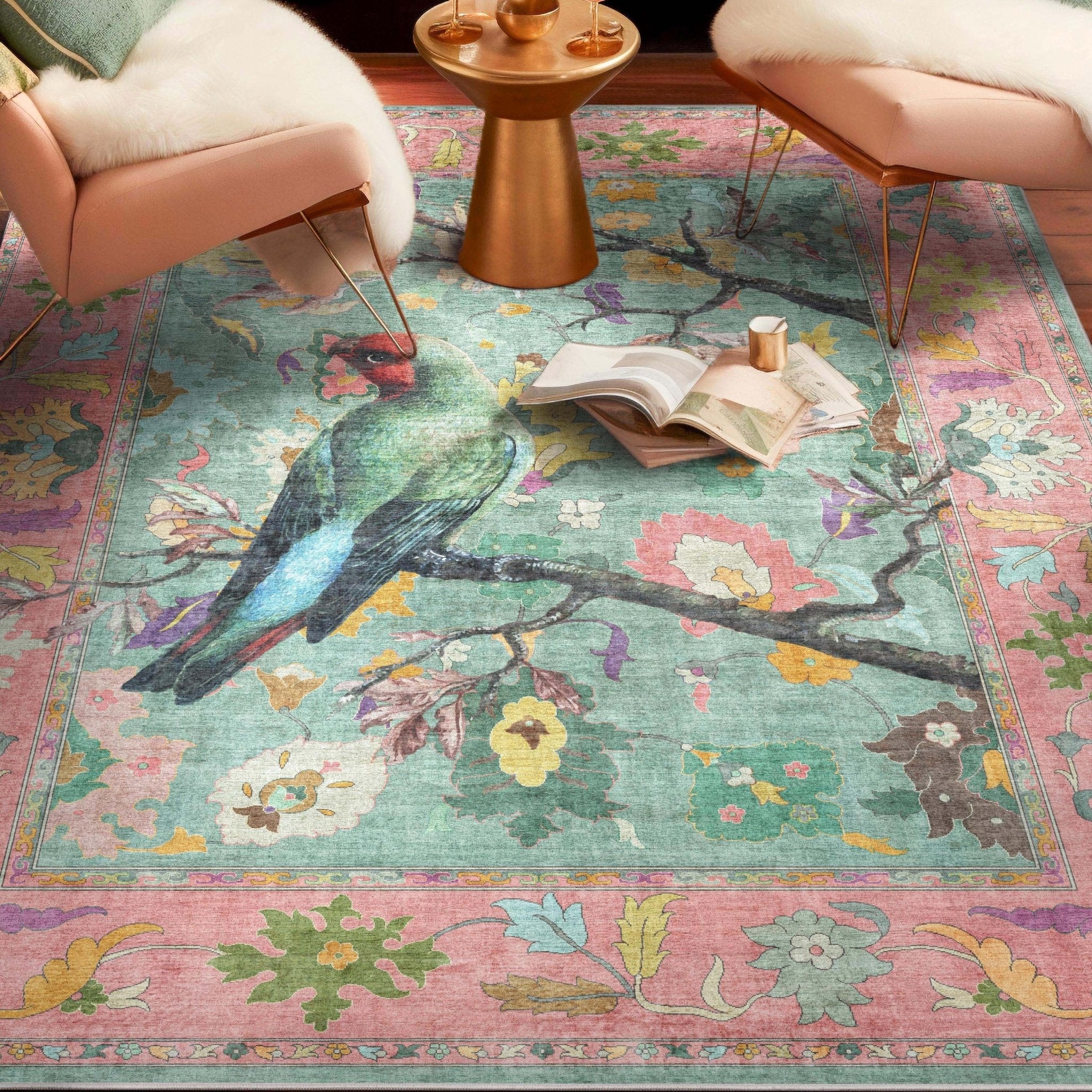 Apollo Botanical Birds Ushak Rug under a cozy seating area with throw pillows and a wooden coffee table.