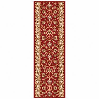 A long rectangular area rug with an ornate traditional floral pattern in deep red, gold, and beige, shown flat against a plain white background.