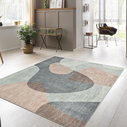 COD-60 Well Woven Holt Washable Rug: Interior scene of the geometric washable rug on a light wood floor with a neutral color scheme.