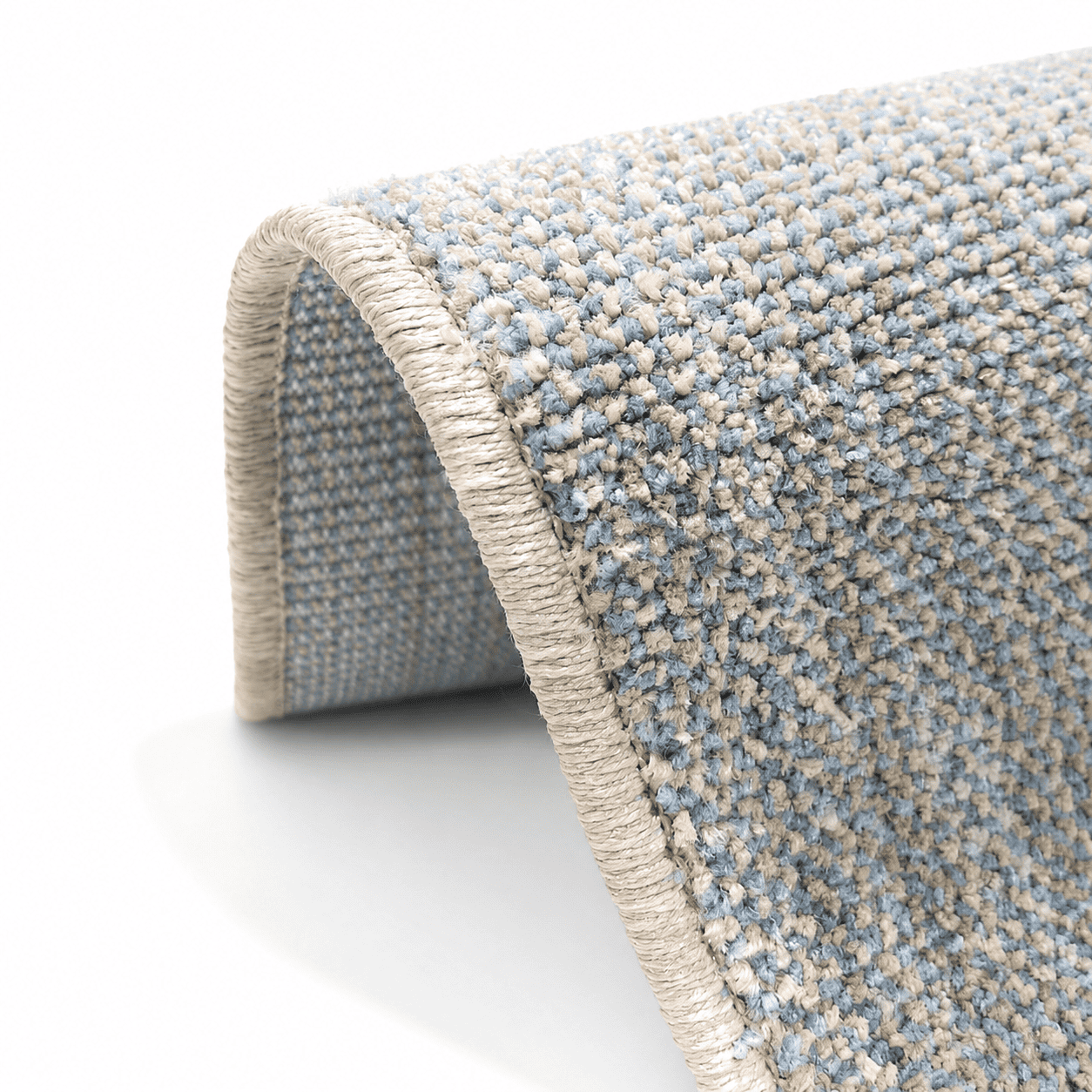 COD-17 - Long light blue and beige runner rug Close-up of a textured blue and beige rug with a white background