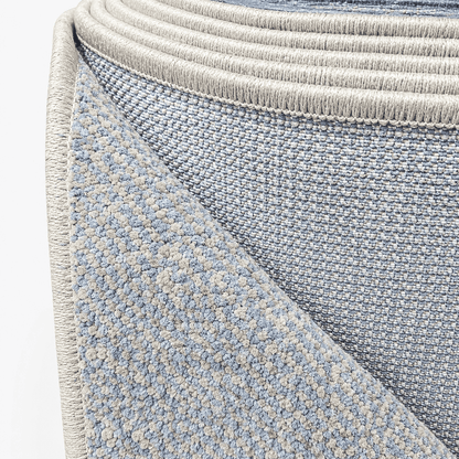 COD-17 - Long light blue and beige runner rug   of a textured blue and gray rug corner