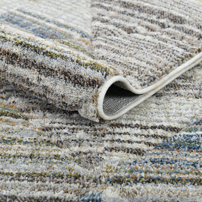 ELM-11 Well Woven Knoll Washable Area Rug: Close up view of a textured area rug with a pattern of stripes and triangles in neutral- and multi-colors.