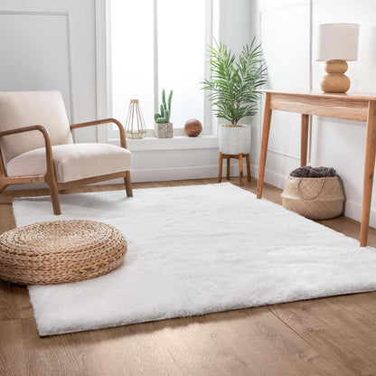 Feather Liza Made-to-Measure Soft-Luster Shag Rug — Powder White — Feather Collection Liza  White Shag Rug –   Sparkly, Plush, Minimalist Glam - Well Woven - solid white shag rug in a living room