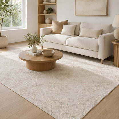 Lafayette Sterling cream and gold abstract area rug in a living room