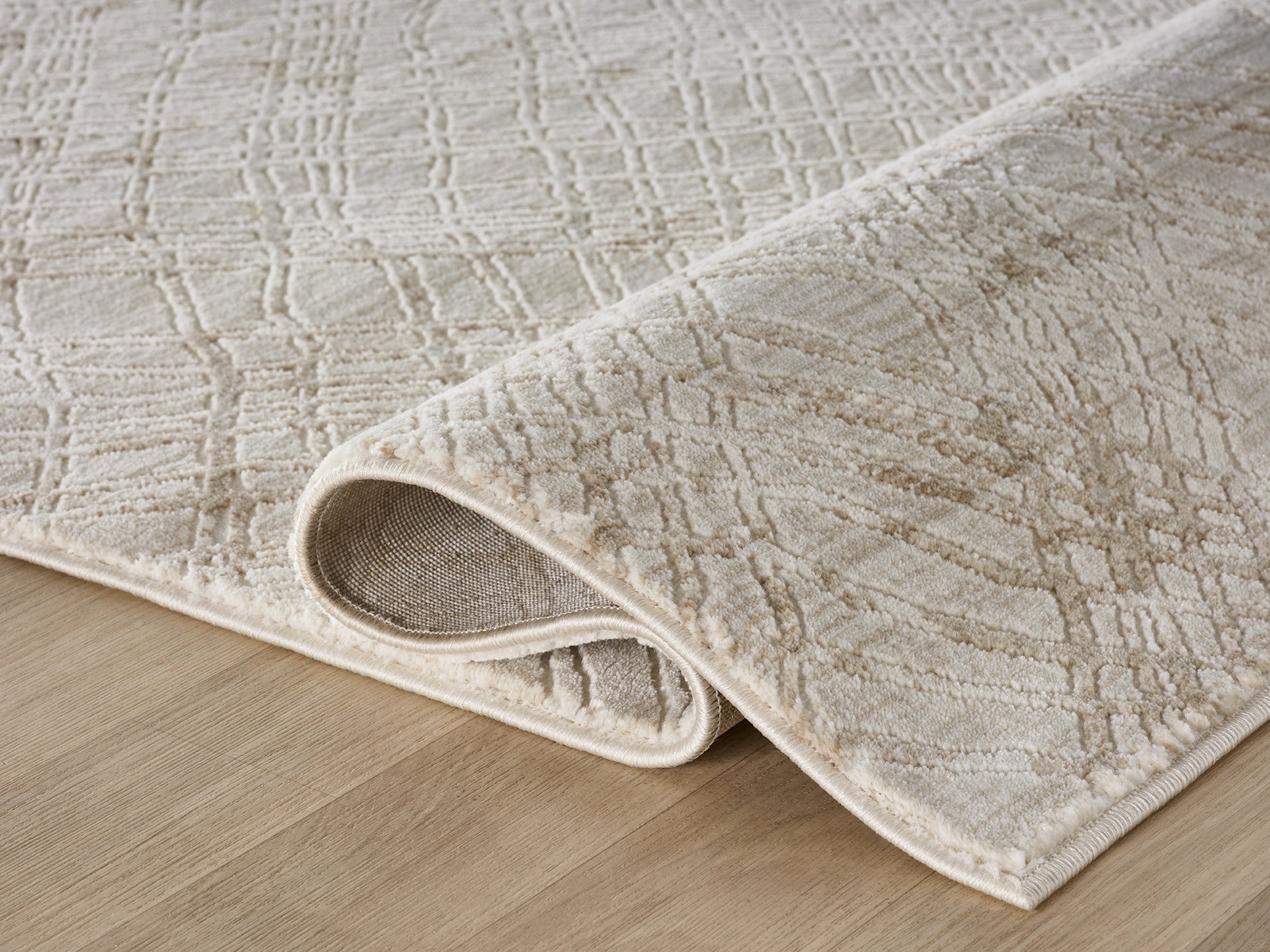 Texture detail of the Lafayette Sterling cream and gold woven surface