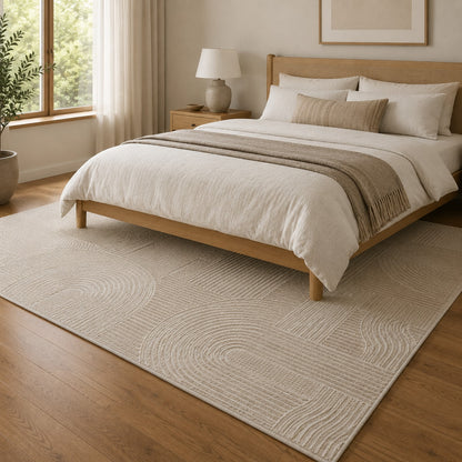 Lafayette Arc beige and cream curved lines area rug in a bedroom