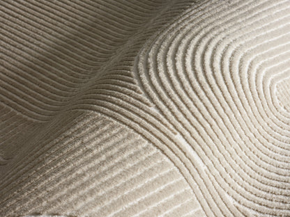 Lafayette Arc beige and cream curved lines area rug, close-up of the high-and-low woven pile