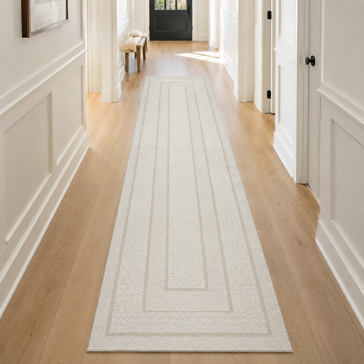 Lafayette Frame ivory and cream border runner in a hallway