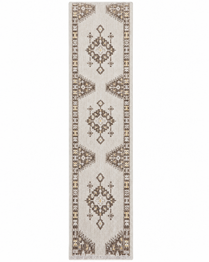 A long rectangular runner rug with a traditional geometric pattern in beige, brown, and cream on a white background.