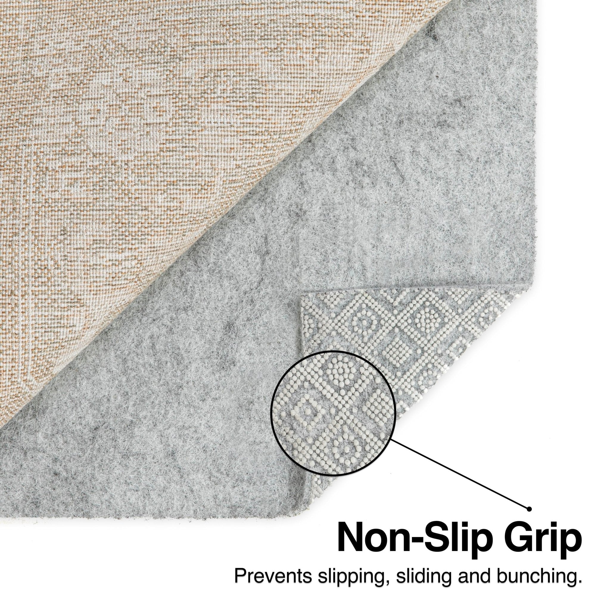 PAD-1 - Well Woven Premium Felt Non-Slip Rug Pad - Infographic of a corner of a felt rug pad with its corner flipped up. The surface with non-slip grip is highlighted in a bubble and called out in text reading "Non-Slip Grip: Prevents slipping, sliding and bunching".