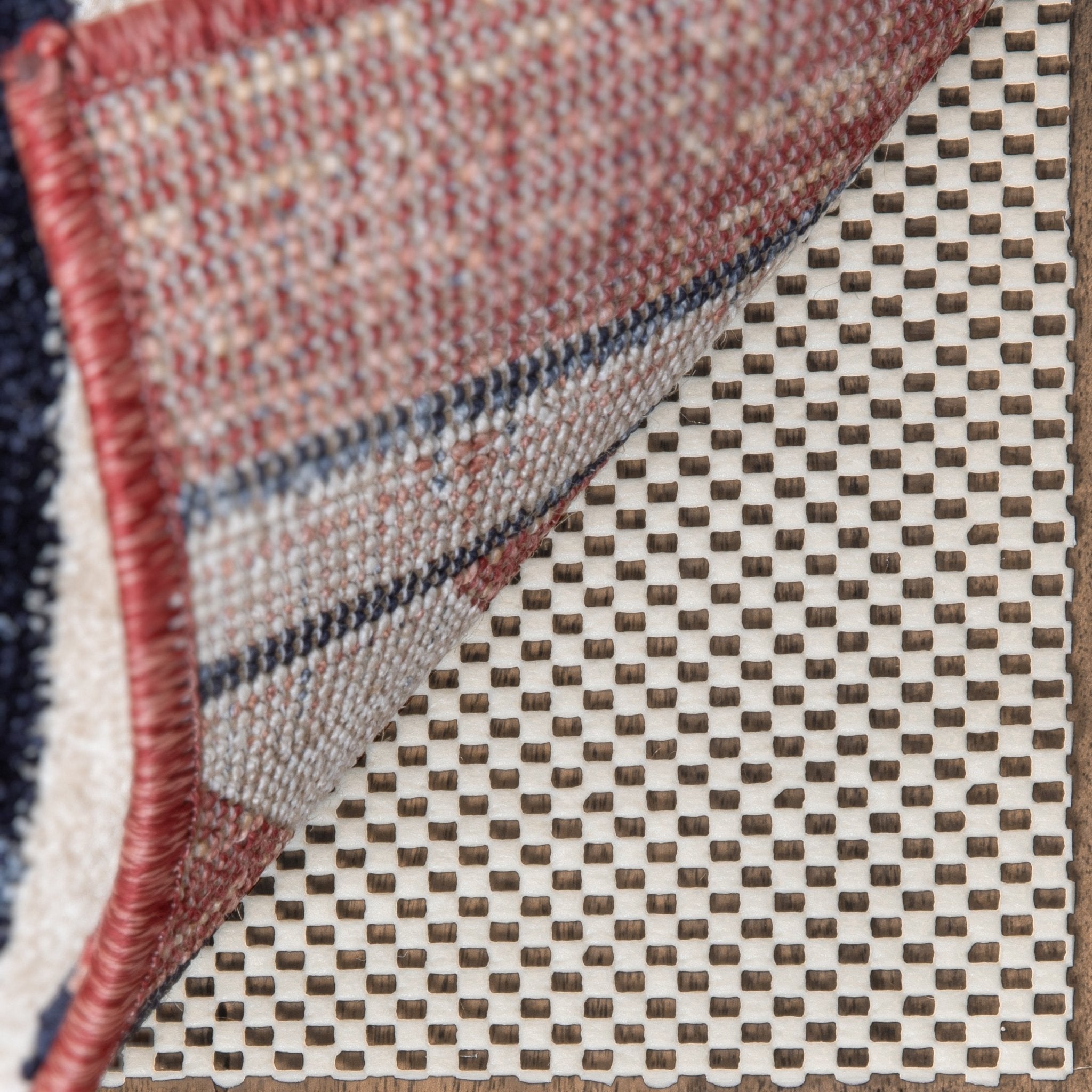 Elle Basics PVC Non-Slip Rug Pad - Close-up of a 1/8" PVC rug pad with a checkered grid pattern