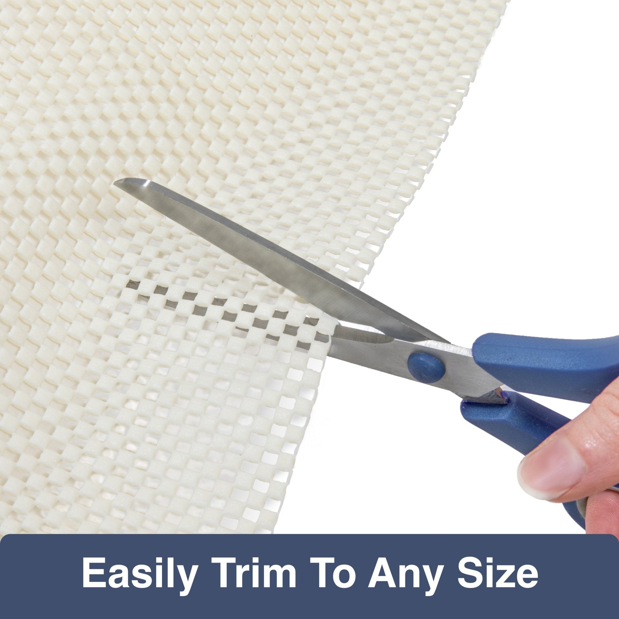Elle Basics PVC Non-Slip Rug Pad - Scissors cutting a piece of PVC rug padding with text 'Easily Trim To Any Size' below.