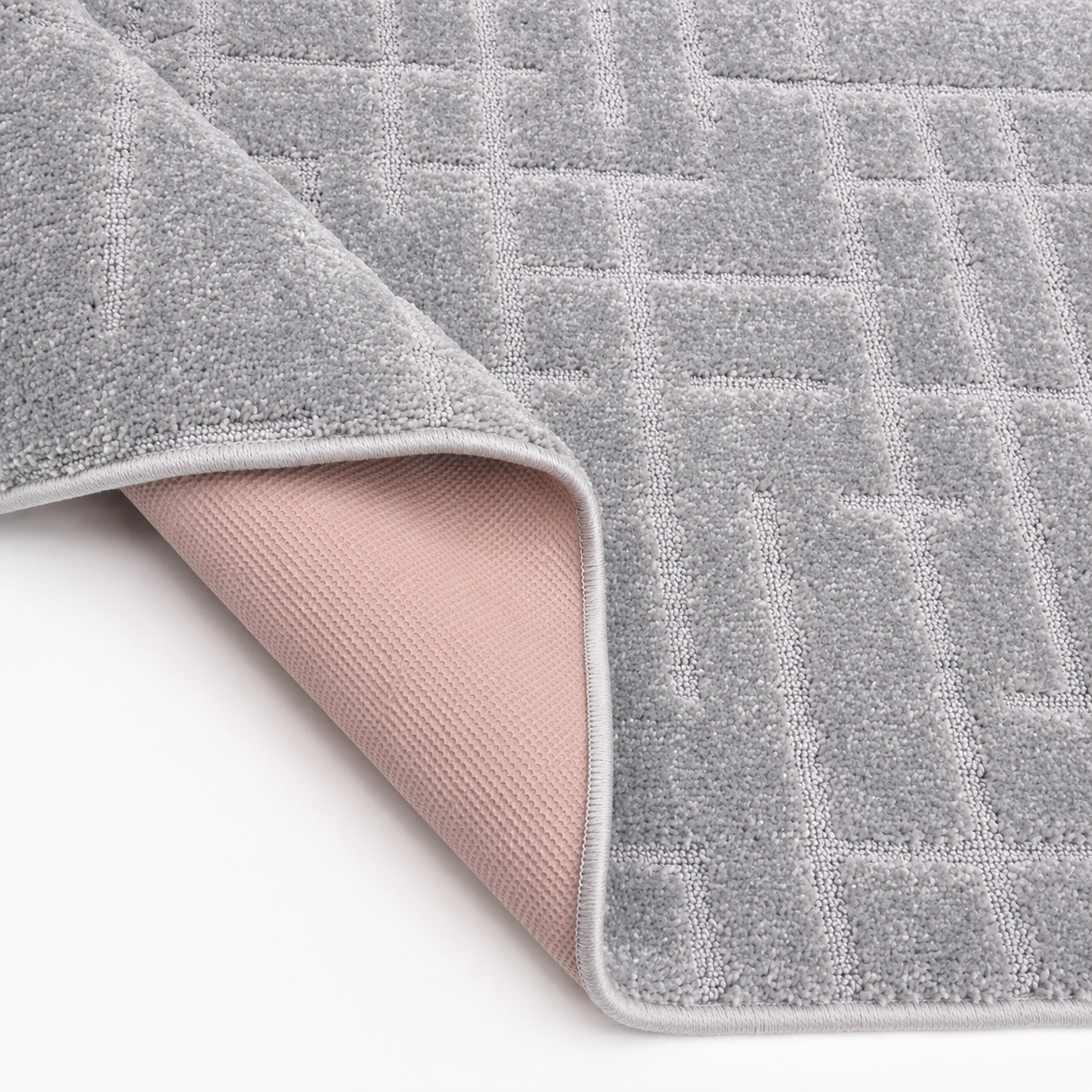 Serenity Soft Linen Silver runner rug flipped corner showing the rubber backing