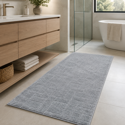 Serenity Soft Parquet Silver runner rug styled beside a bathroom vanity