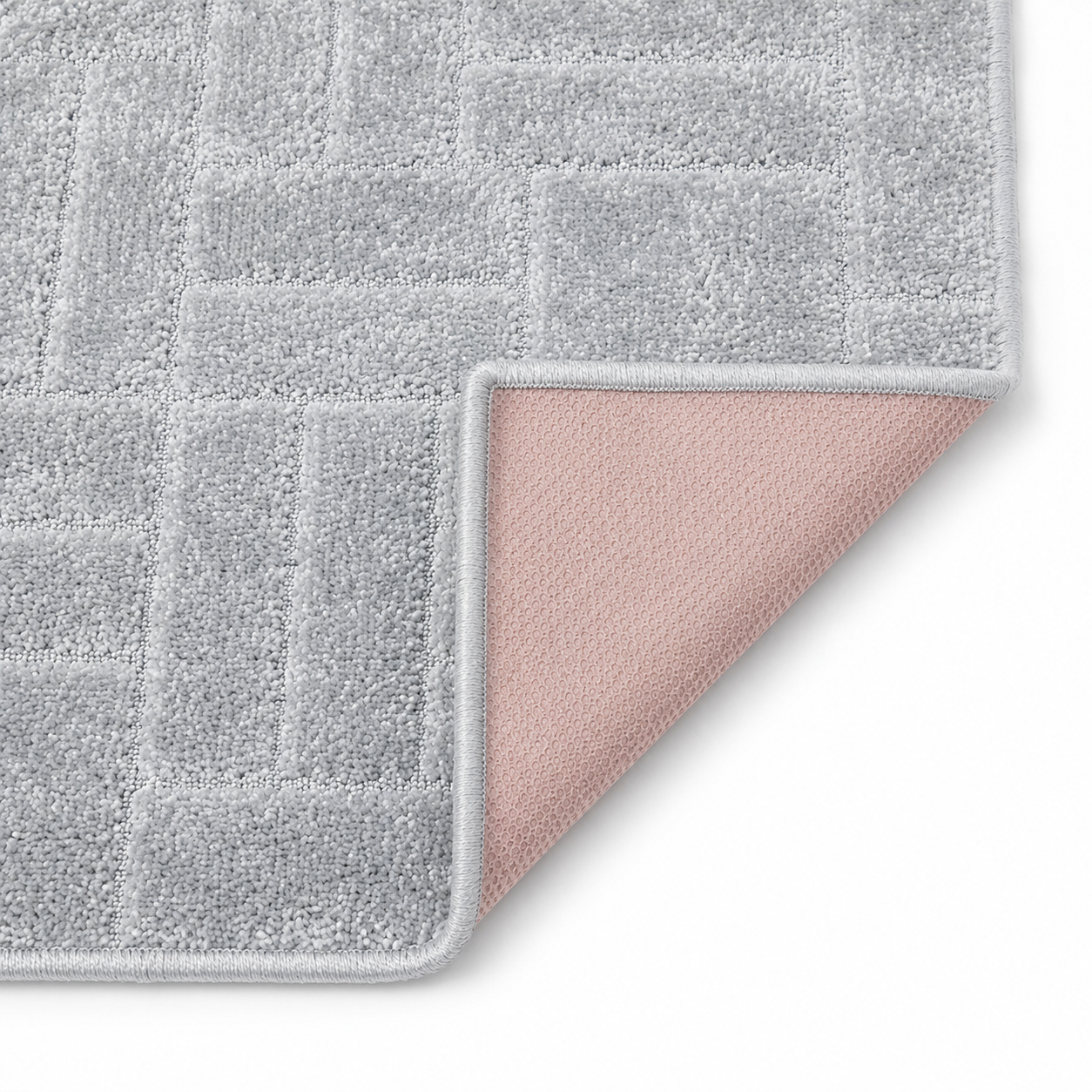 Serenity Soft Parquet Silver runner rug flipped corner showing the rubber backing