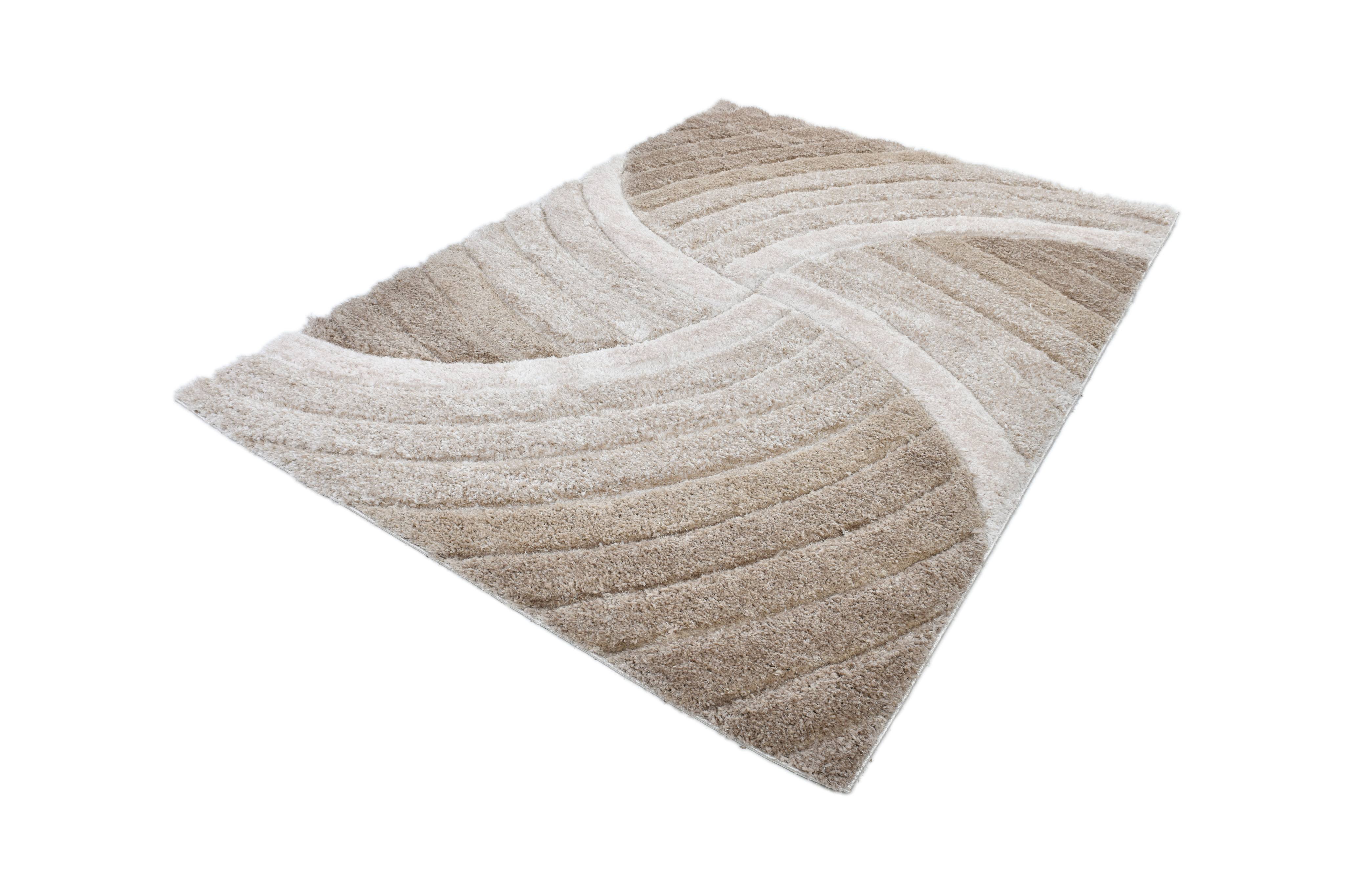 Angled flat-lay view of the Ucci beige geometric shag rug on a white background