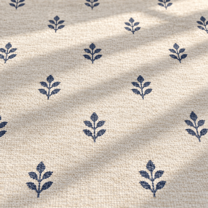 Apollo Little Orchard Area Rug — Navy / Cream — pattern and surface detail in soft afternoon light. Digital visualization.