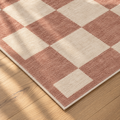 Apollo Sunday Check Area Rug — Dusty Rose / Cream — corner and edge detail in soft afternoon light. Digital visualization.
