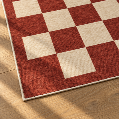 Apollo Sunday Check Area Rug — Red / Cream — corner and edge detail in soft afternoon light. Digital visualization.