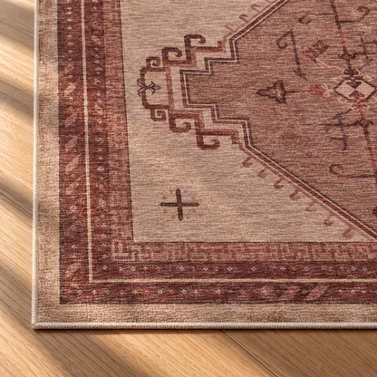 Apollo Wayfarer Court Area Rug — Dusty Burgundy / Beige — corner and edge detail in soft afternoon light. Digital visualization.