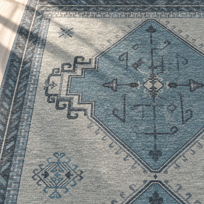 Apollo Wayfarer Court Area Rug — Petrol Blue / Beige — pattern and surface detail in soft afternoon light. Digital visualization.