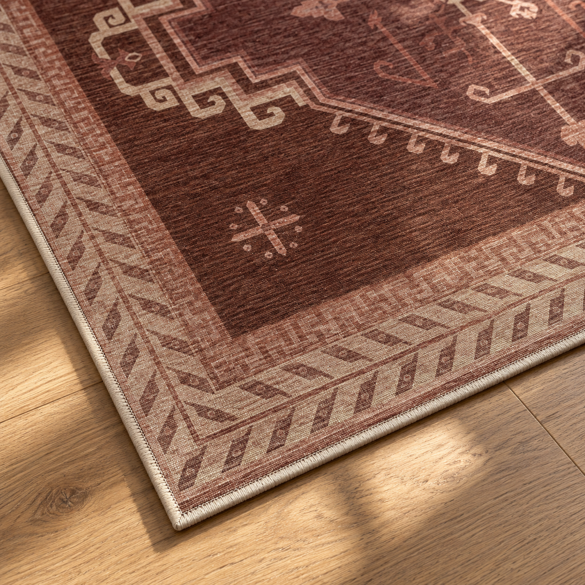 Apollo Wayfarer Court Area Rug — Deep Burgundy / Beige — corner and edge detail in soft afternoon light. Digital visualization.