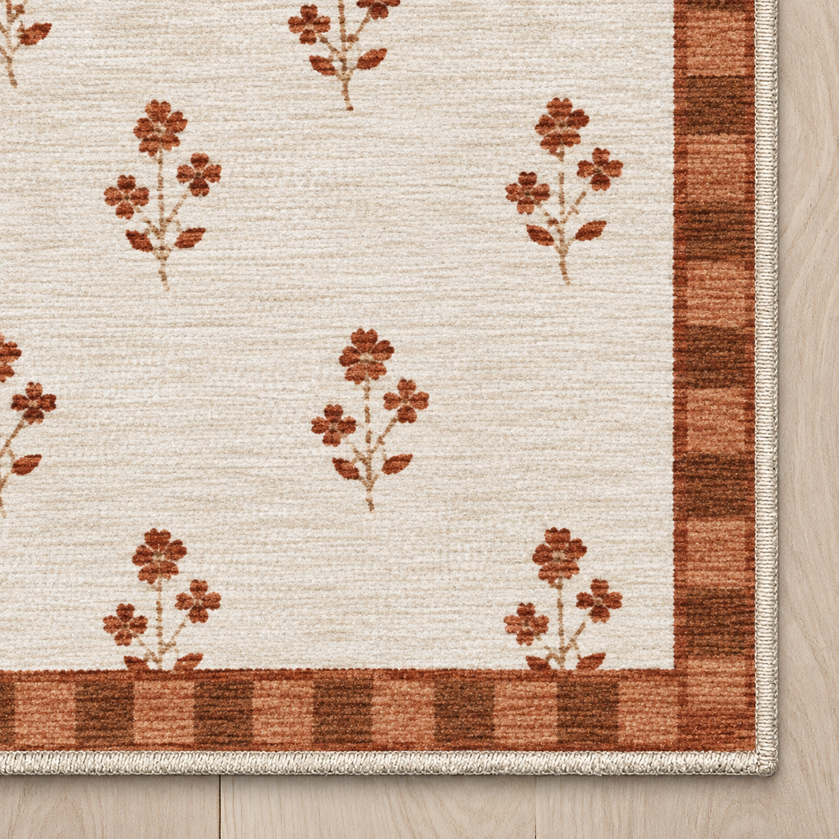 Top-down Apollo Posy Walk in Terracotta / Beige: chenille corner and cream serged edge — digital material visualization, not a finished-rug photograph.
