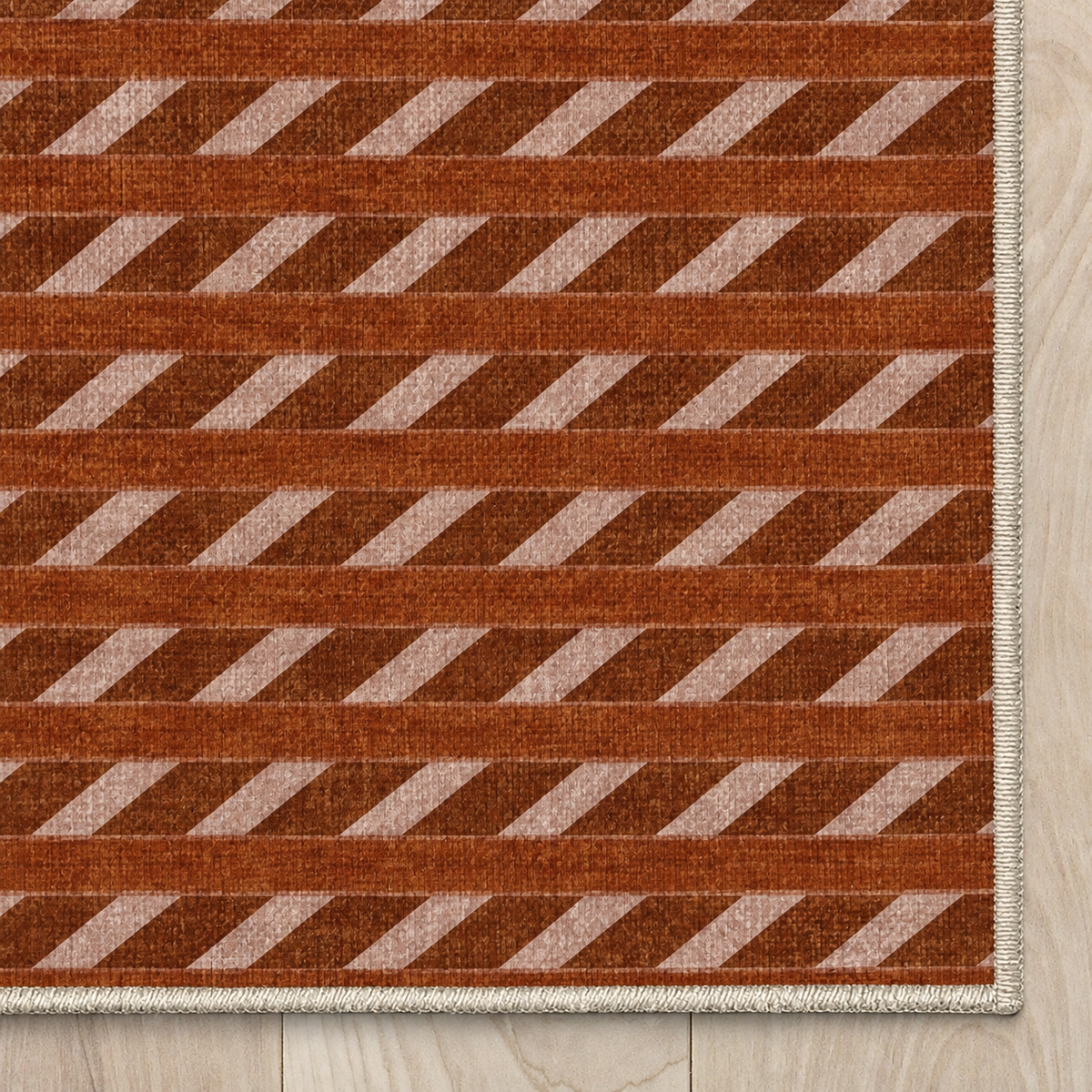 Top-down Apollo Slant Row in Terracotta / Clay: chenille corner and cream serged edge — digital material visualization, not a finished-rug photograph.