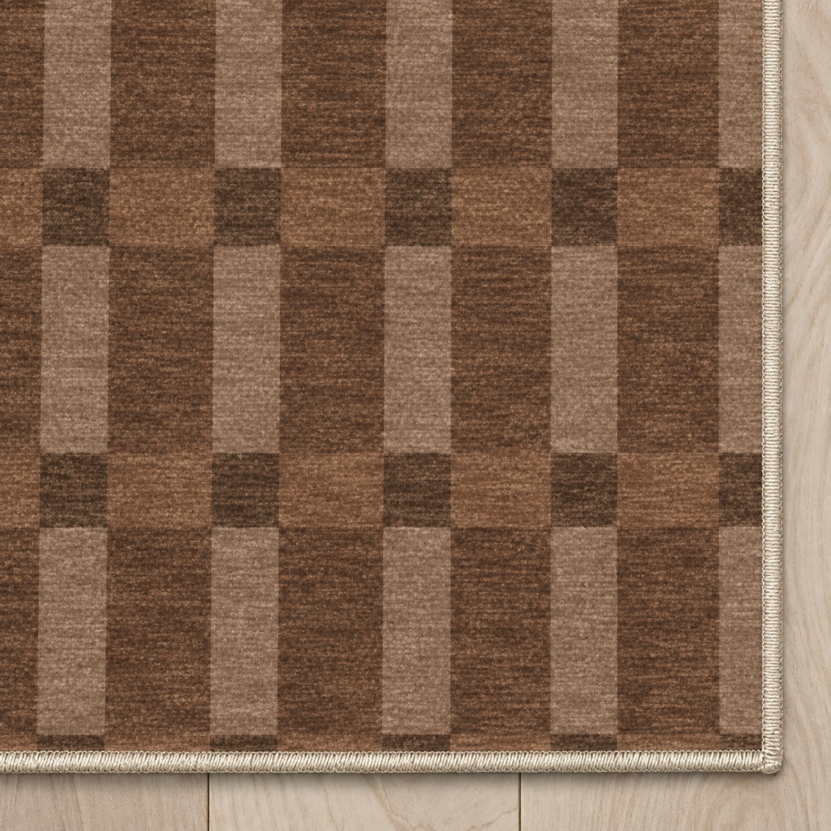 Top-down Apollo Pavilion Step in Light Brown / Taupe: chenille corner and cream serged edge — digital material visualization, not a finished-rug photograph.
