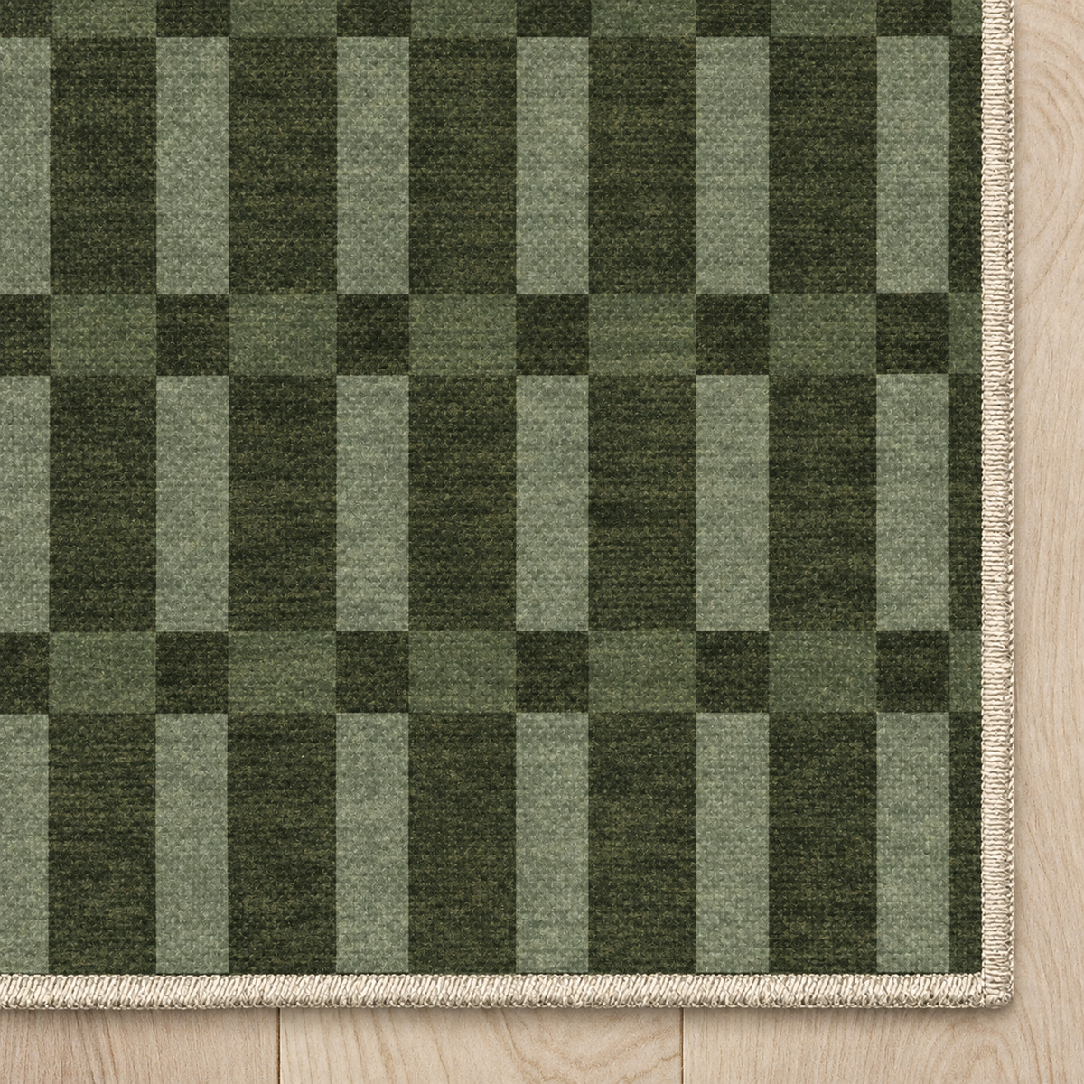 Top-down Apollo Pavilion Step in Green / Sage: chenille corner and cream serged edge — digital material visualization, not a finished-rug photograph.