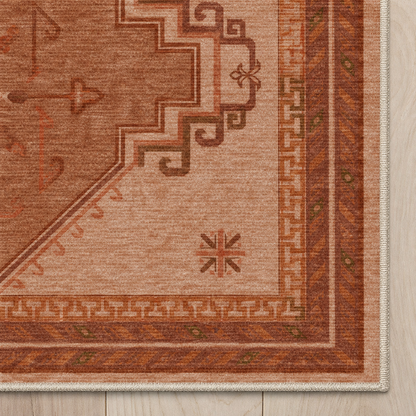 Top-down Apollo Wayfarer Court in Terracotta / Beige: chenille corner and cream serged edge — digital material visualization, not a finished-rug photograph.