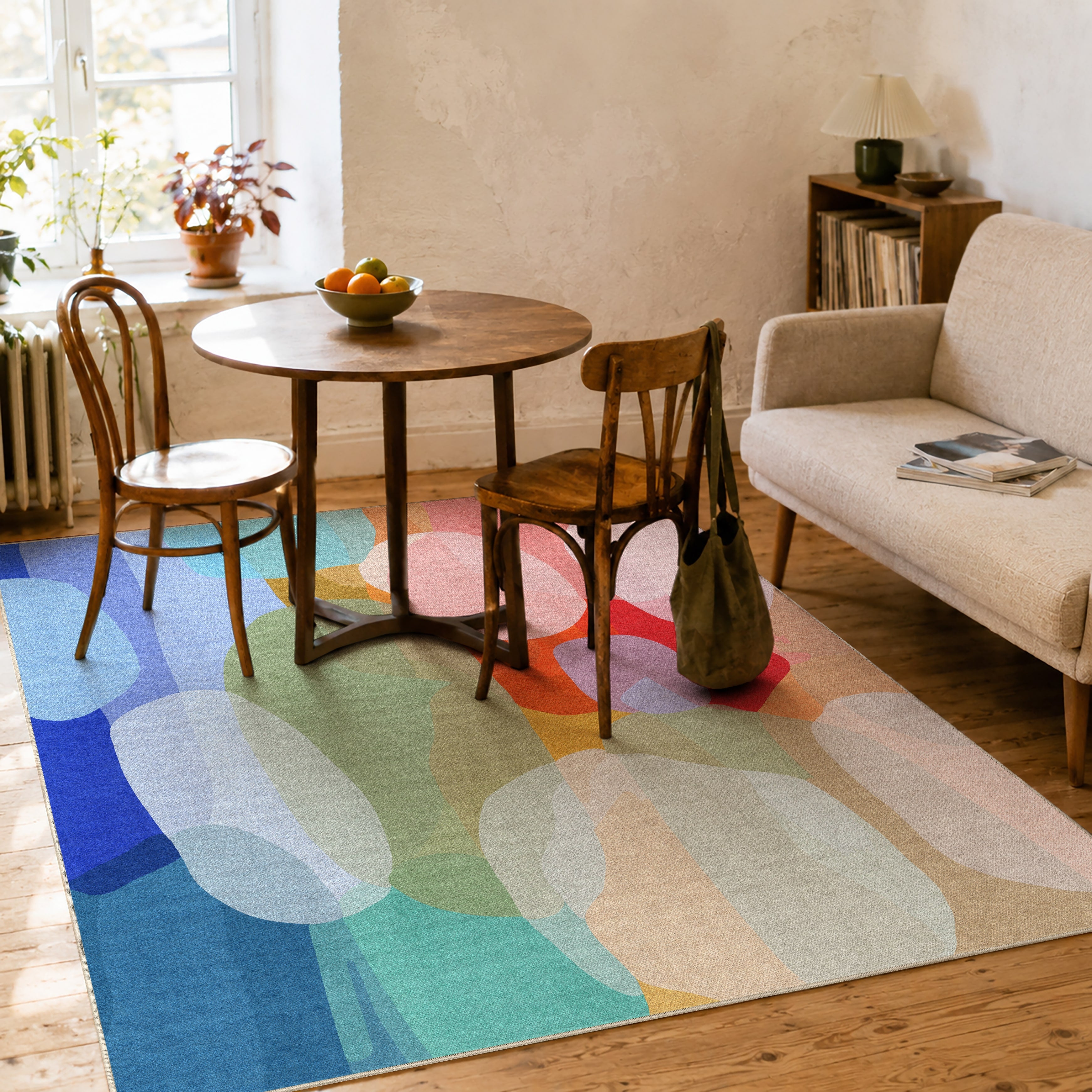 Make Me Laugh rug by Claire Desjardins, styled in a room.