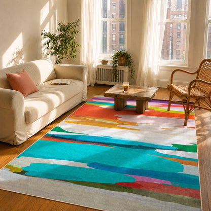 On Holiday rug by Claire Desjardins, styled in a room.