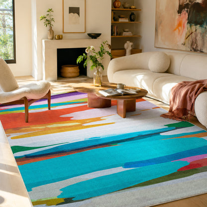 On Holiday rug by Claire Desjardins, styled in a room.