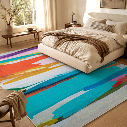 On Holiday rug by Claire Desjardins, styled in a room.