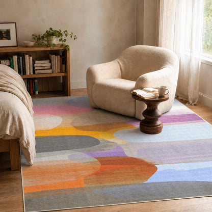 When the Sun Sets rug by Claire Desjardins, styled in a room.