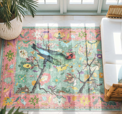 Apollo Botanical Birds Ushak Rug photographed in a bright sunlit room with greenery and minimalist living room décor.