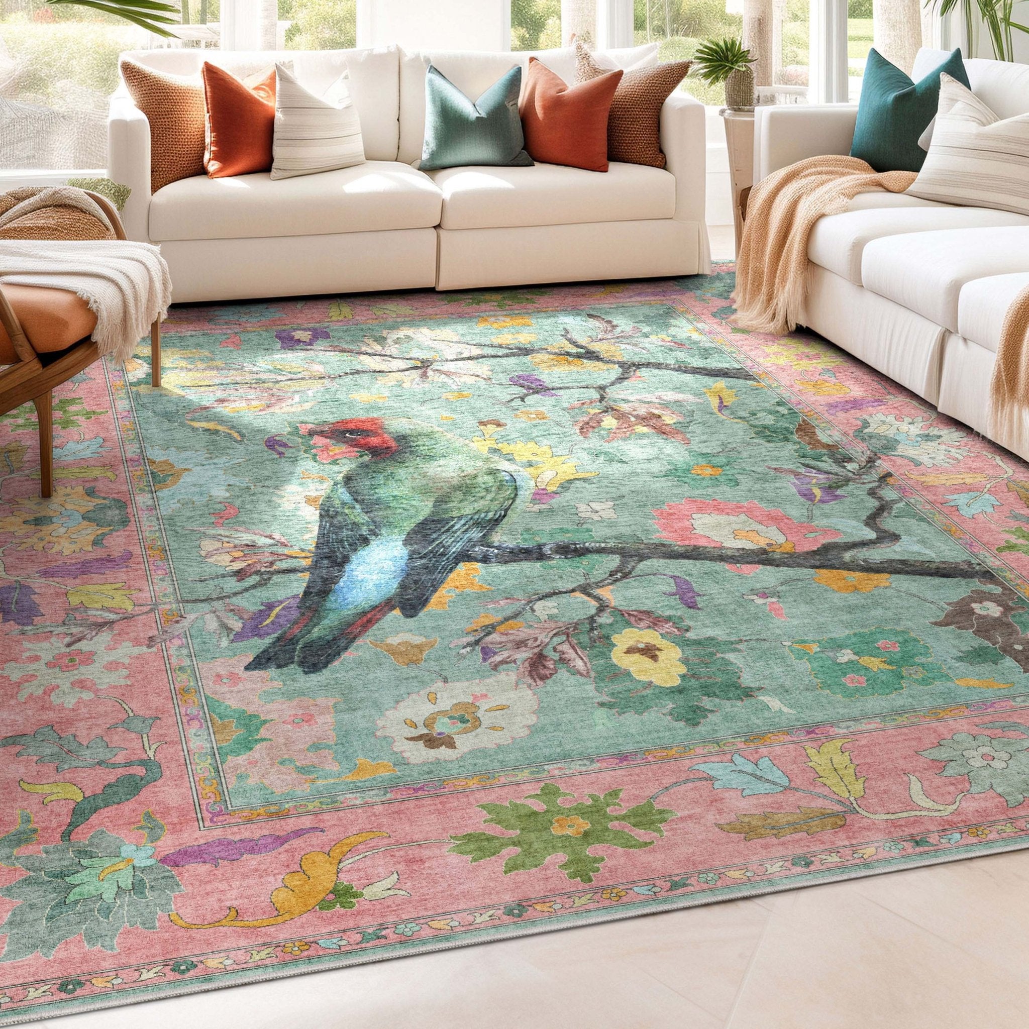 Apollo Botanical Birds Ushak Rug displayed in a bright living room with cream sofas and an accent chair